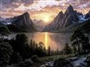 a sunset over a lake