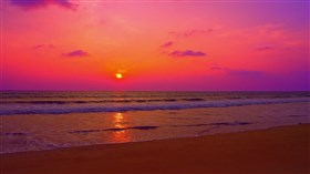 Ocean Waves At A Pink sunset
