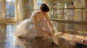  tying her pointe shoes