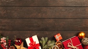 Christmas Gifts on Wood Floor